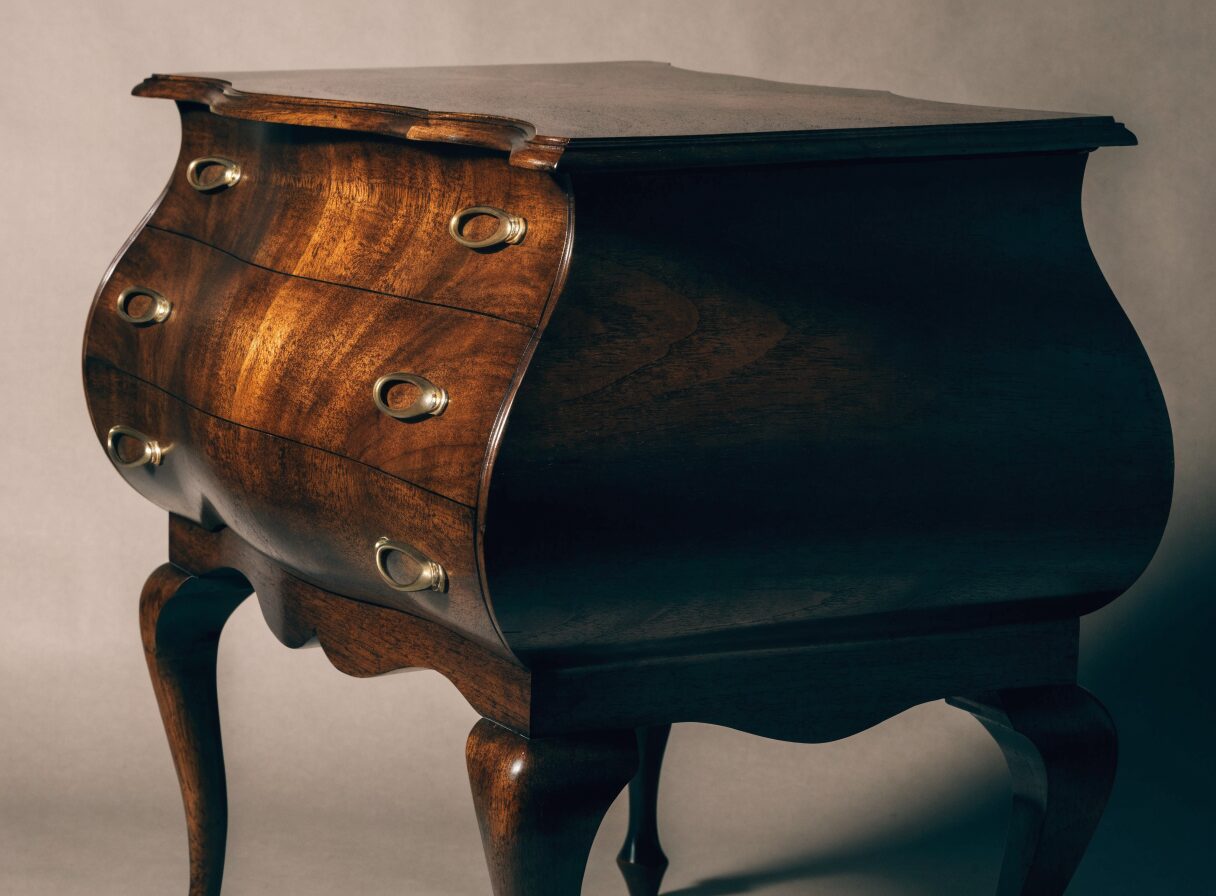 An antique bombe chest, representative of the antique furniture we handle